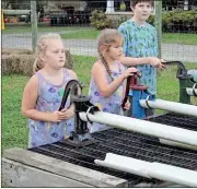  ?? Tyler Williams / Standard Journal ?? Carnival games are part of the fun at Carlton Farms fall corn maze. Carlton farm is open on the weekends through Nov. 4, and will host the public on Fridays from 6 p.m. to 9 p.m., Saturdays 11 a.m. to 9 p.m., and Sundays from 12 p.m. to 7 p.m.