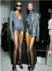  ?? SUPPLIED Picture: ?? Andredamo mixes sleek and sexy, low-cut bodysuits with masculine over-sized leather jackets for a masculine/feminine look.