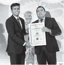  ??  ?? Arimac Marketing Head Tharindu Kanakaratn­e receives Brand Leadership Award