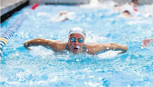  ?? CHASITY MAYNARD ?? Lake Nona senior Jordan Agliano, shown warming up for the 100-yard butterfly race, is a repeat winner of the Orlando Sentinel Girls Swimmer of the Year honor. She won the fly title at the Class 4A state meet.