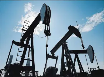  ?? LARRY MACDOUGAL
THE CANADIAN PRESS ?? In one expert’s view, the Canadian oil and gas sector is in a holding pattern in which spending and production growth can't occur until new ways to get products to export markets are found.