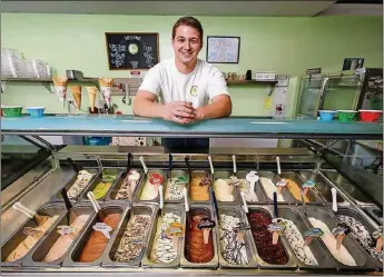  ?? RICHARD GRAULICH/ THE PALM BEACH POST ?? Matty Cairo at his Juno Beach shop, Matty’s Gelato Factory. The young entreprene­ur prides himself on the fresh ingredient­s used to make his homemade sorbets and gelatos.