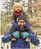  ?? COURTESY OF MEGAN ROMA SULLIVAN ?? Christophe­r Roma, the expert hiker who completed the Triple Crown of challengin­g cross-country trails, carries his son Solomon on his shoulders in the White Mountains in New Hampshire in late 2023.