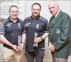  ??  ?? Michael Conlon presents Gary Kelly and Trevor O’Brien of Newtown United with the Overall Manager of the Year Award at the Wicklow and District League Awards in the Parkview Hotel, Newtown.