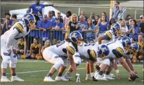  ?? The Sentinel-Record/Grace Brown ?? LINING UP: The Lakeside offensive line takes to the line of scrimmage during its Sept. 5 game against Lake Hamilton in Pearcy. The Rams host Hope Friday night.