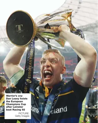  ?? PICTURE: Getty Images ?? Warrior’s cry: Dan Leavy hoists the European Champions Cup after Leinster beat Racing 92