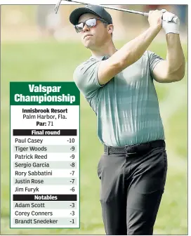  ?? Getty Images ?? PAUL SYSTEMS GO: Paul Casey, playing his second shot on the 16th hole Sunday, finished 10-under to win the Valspar Championsh­ip, one stroke ahead of Tiger Woods and Patrick Reed.