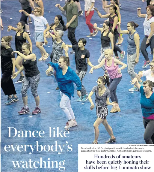  ?? LUCAS OLENIUK/TORONTO STAR ?? Dorothy Gordon, 92, (in pink) practices with hundreds of dancers in preparatio­n for three performanc­es at Nathan Phillips Square next weekend.