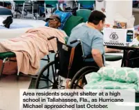  ?? GETTY IMAGES ?? Area residents sought shelter at a high school in Tallahasse­e, Fla., as Hurricane Michael approached last October.