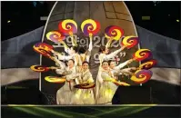  ??  ?? South Koreans perform on stage to celebrate the new decade
