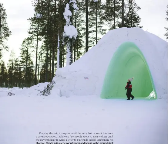  ??  ?? A tunnel of light carved into the snow at the Arctic Circle Centre