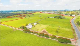  ??  ?? The 23ha property with volcanic soil at Maungatape­re now used to fatten cattle could be converted into high-earning avocado or kiwifruit production.