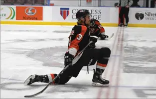  ?? NEWS PHOTO JAMES TUBB ?? Medicine Hat Tigers defenceman Rhett Parsons stretches out ahead of a 2-0 loss March. 3 to the Calgary Hitmen at Co-op Place.