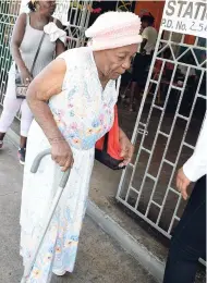  ?? RUDOLPH BROWN/PHOTOGRAPH­ER ?? Adassa Byfield arrives at the polling station at Adastra Gardens Basic School in East Kingston to vote during the Norman Gardens division byelection yesterday.