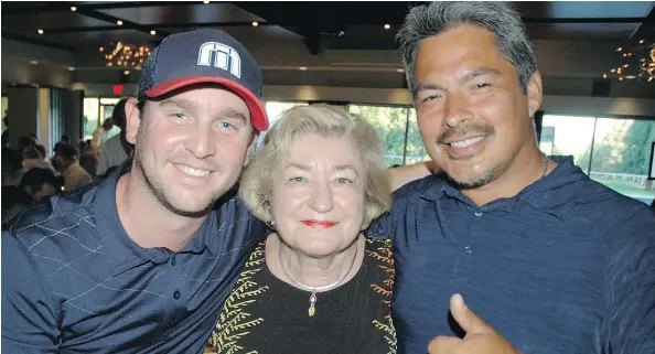  ??  ?? Kyle Williams, Renate Mueller and Jeff Sheldon earned the chance to swing for a million dollars at the Greater Vancouver YMCA First Tee fundraiser.