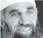  ?? Int. Committee of the Red Cross, 2014 ?? Guantánamo prisoner Abd al Hadi al Iraqi is recovering from spinal surgeries. He is accused of commanding and paying insurgents who attacked U.S. and allied forces, as well as civilian-aid workers, in the post 9/11 invasion of Afghanista­n.