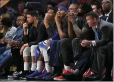  ??  ?? Los Angeles Clippers sit on the bench during the second half of the team’s NBA basketball game against the Los Angeles Lakers on Wednesday in Los Angeles. The Lakers won 115-100. AP PHOTO/ MARK J. TERRILL