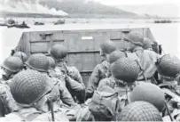  ??  ?? American assault troops approach Utah Beach while Allied forces storm the beaches in Normandy, France, on D-Day, June 6, 1944. STF/AFP/Getty Images file