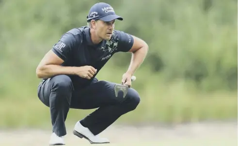  ??  ?? Henrik Stenson lines up a putt en route to carding a 69 in the second round of the BMW Internatio­nal Open yesterday.