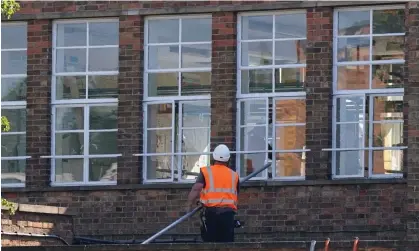  ?? Photograph: Jacob King/PA ?? Remedial work being carried out at a primary school with Raac in Leicester.