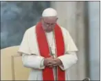  ?? ALESSANDRA TARANTINO — ASSOCIATED PRESS FILE PHOTO ?? In this file photo dated Tuesday, July 31, 2018, Pope Francis prays during an audience in St. Peter’s square at the Vatican. The Vatican said Thursday Aug. 2, 2018, that Pope Francis has changed church teaching about the death penalty, saying it can never be sanctioned because it “attacks” the inherent dignity of all humans.