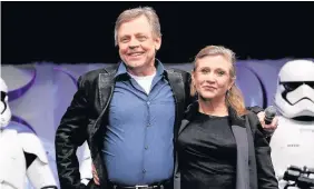  ??  ?? Mark Hamill pictured with Carrie Fisher in 2015