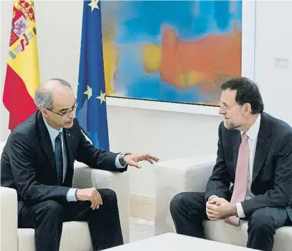  ?? Dani Duch / LRCHIVO ?? El jefe de gobierno de Andorra, Antoni Martí, con Rajoy en Madrid en septiembre del 2012