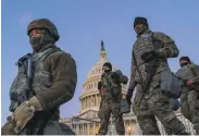 ?? J. Scott Applewhite / Associated Press ?? National Guard troops reinforce a security zone Jan. 19 surroundin­g Capitol Hill in Washington.