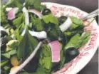  ??  ?? Take Italian parsley beyond garnish in a salad that uses it for the main green then adds black olives, garbanzo beans and slivers of red onion.