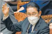  ?? AFP ?? PM Fumio Kishida raises a hand to answer questions during the budget committee session at the parliament in Tokyo.