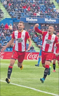  ??  ?? GOL ROJIBLANCO. Stuani festeja el tanto que logró en Getafe.