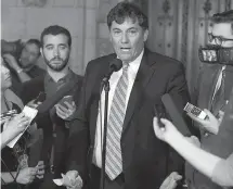  ??  ?? Federal Fisheries Minister Dominic LeBlanc speaks to reporters after his meeting with representa­tives from the lobster fishery.