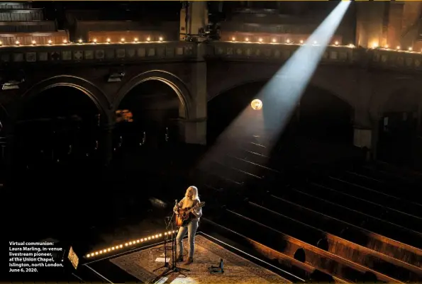  ??  ?? Virtual communion: Laura Marling, in-venue livestream pioneer, at the Union Chapel, Islington, north London, June 6, 2020.