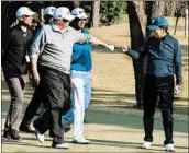  ?? JAPANESE GOVERNMENT 2017 ?? President Donald Trump’s visit to Japan included golf with Japan’s Shinzo Abe, right, who will visit Trump on Tuesday.