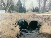  ?? PHOTOS PROVIDED. ?? This is a before and after shot of a culvert replacemen­t on 7B Road. The County Highway Department performed the work and took three days and $56,000 to complete.