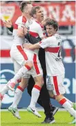  ?? FOTO: DPA ?? Teilen sich die Freude: Florian Klein (Mi.) jubelt mit Alexandru Maxim (li.) und Benjamin Pavard (re.) – irgendwo dazwischen ist Trainer Hannes Wolf ebenfalls nicht gerade traurig.