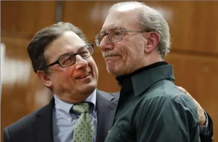  ?? RICHARD DREW, THE ASSOCIATED PRESS ?? Stan Patz, right, father of six-year-old Etan Patz who disappeare­d on the way to the school bus stop 38 years ago, reacts to guilty verdict.