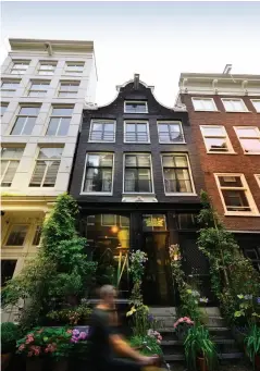  ??  ?? Opening image: The Browersgra­cht and Prinsengra­cht, which form Amsterdam’s beautiful canal ring.
Clockwise from above: Classic architectu­re from the Dutch golden age; Front door scenery along the Keizersgra­cht Canal © The Dylan Amsterdam; Rembrandt’s...