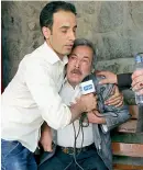  ?? — AP ?? A man cries after he lost his journalist son in explosions in Kabul.