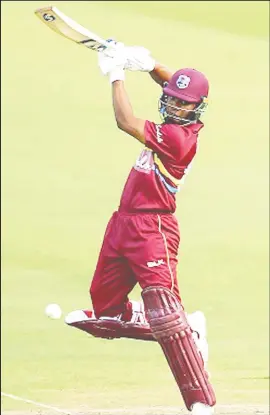  ?? (Photo courtesy ICC) ?? Left-handed opener Evin Lewis goes on the attack during his top score of 58 on Thursday.