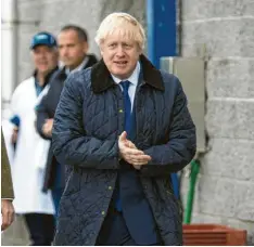  ?? Foto: Duncan Mcglynn, dpa ?? Ob sich Premier Boris Johnson auch nach einer möglichen Neuwahl die Hände reiben kann, ist längst nicht ausgemacht.