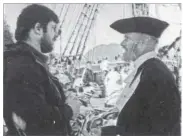  ??  ?? Top right: William Twombly, left, a descendant of Captain Robert Gray, talks to Les Bolton, executive director of the Grays Harbour Historical Seaport Authority, aboard the Lady Washington in Clayoquot Sound, B.C.