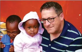  ??  ?? Jimmy Murphy from Tralee has been hailed as a hero for coming to the aid of a hit and run victim while visiting the Tír na nÓg orphanage in Tanzania.