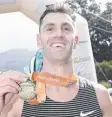  ??  ?? Julian Spence won his fourth Great Ocean Road Marathon.