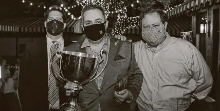  ?? Eric Forsythe / Forsythe Fotography ?? Sean Beck, from left, Evan Turner and John Clutterbuc­k at the 2020 Iron Sommelier competitio­n