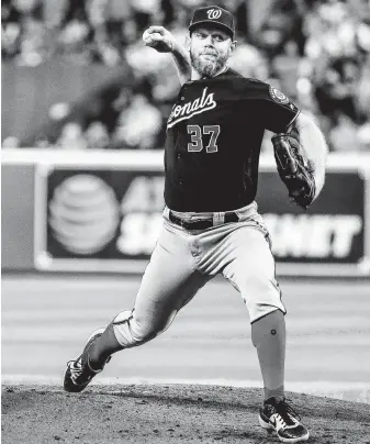  ?? Brett Coomer / Staff photograph­er ?? Stephen Strasburg allowed two runs on five hits with seven strikeouts in 81⁄3 innings in Game 6. Both of the Astros’ runs came in the first inning. After the first, Strasburg dominated.