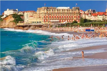  ??  ?? Decadent old dame: The Hotel du Palais overlookin­g the Grande Plage of Biarritz