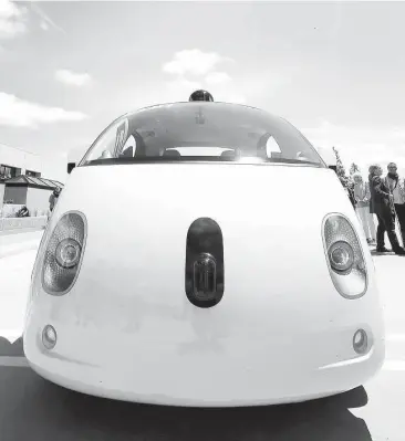  ?? Associated Press file ?? Google’s self-driving prototype makes an appearance last year at the company’s campus in Mountain View, Calif. If you hop into one of Google’s pod-like self-driving cars, you won’t be considered the “driver,” according to a letter sent to the company...