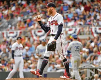  ?? HYOSUB SHIN / HSHIN@AJC.COM ?? Braves right-hander Mike Foltynewic­z, who was 13-10 with a 2.85 ERA last season, is expected to be the opening-day starter against the Phillies on March 28 in Philadelph­ia.