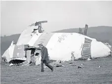  ??  ?? Bombed Pan Am flight 103 crashed in Lockerbie.